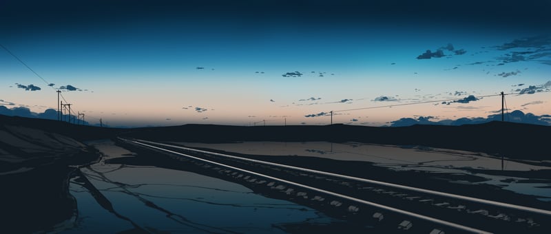 Railway tracks at dusk with reflection and gradient sky