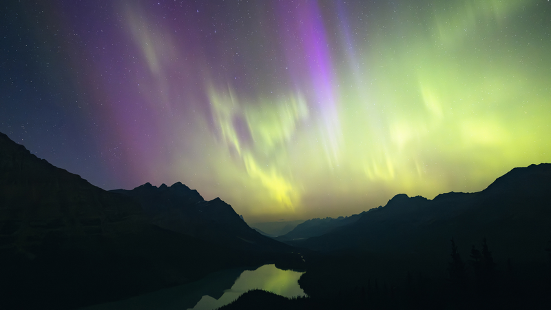 Aurora Borealis over Canadian Mountains and Lake