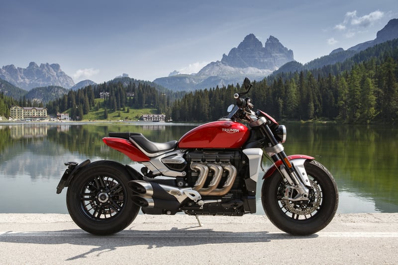 Triumph Rocket III motorcycle parked by a lake