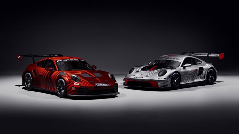 Porsche 911 race cars in red and silver liveries