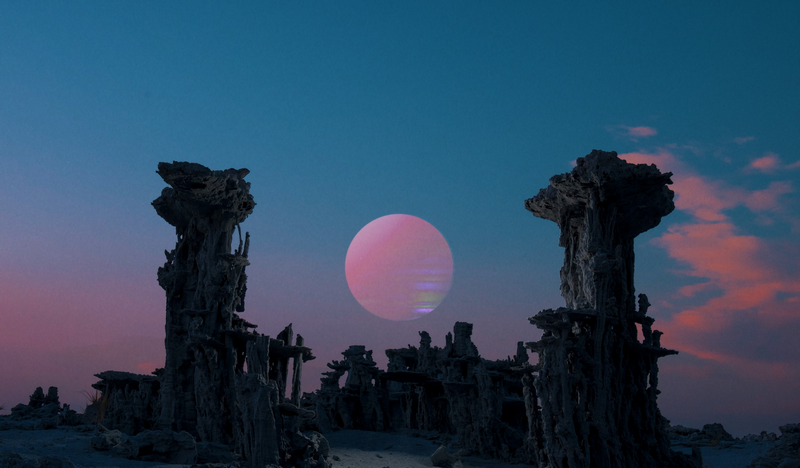 Tufa formations under a pink moon at sunset