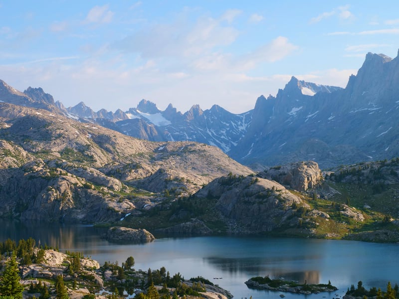 Lake and jagged mountains in Wyoming, USA