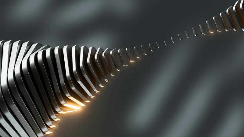 Abstract metallic waves with glowing orange light