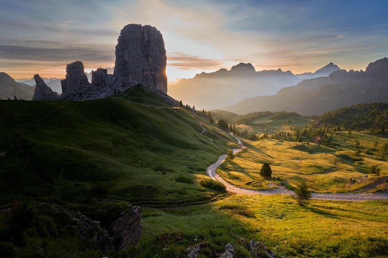 Cinque Torri and path in Dolomites at sunrise