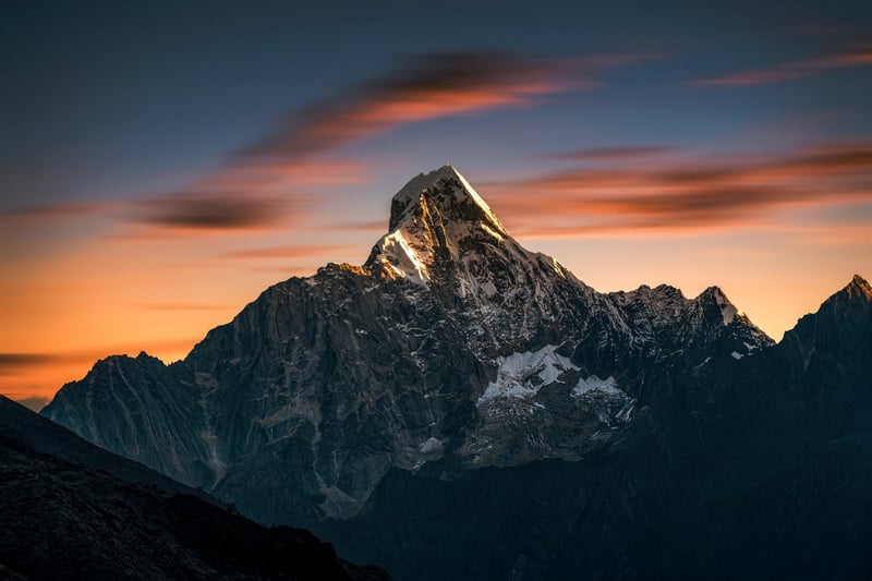 Snowy peak of Siguniang mountain at sunset