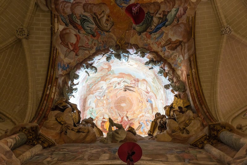Baroque ceiling painting with angels in Toledo Cathedral