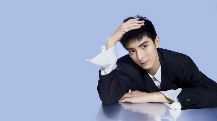 Wang Hao Xuan poses with hand on head
