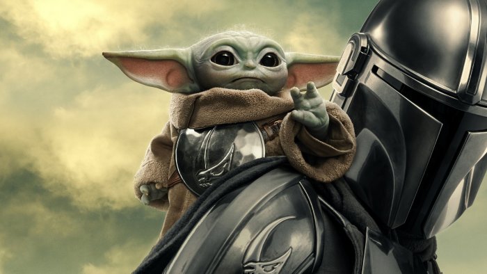 Grogu and Din Djarin in Star Wars The Mandalorian