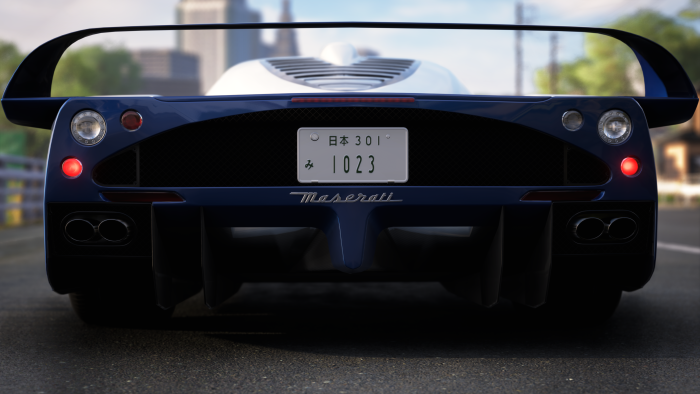 Blue Maserati MC12 Rear View with Japanese License Plate