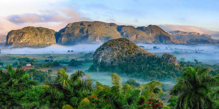 Mogote hills in Viñales Valley with morning mist
