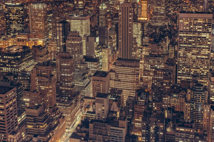Dense City Skyscrapers Illuminated at Night
