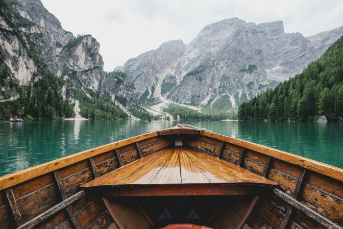 Wooden boat on Lago di Braies in the Dolomites