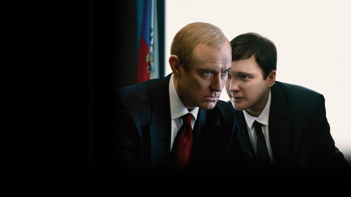 Two men in suits in The Wizard of the Kremlin