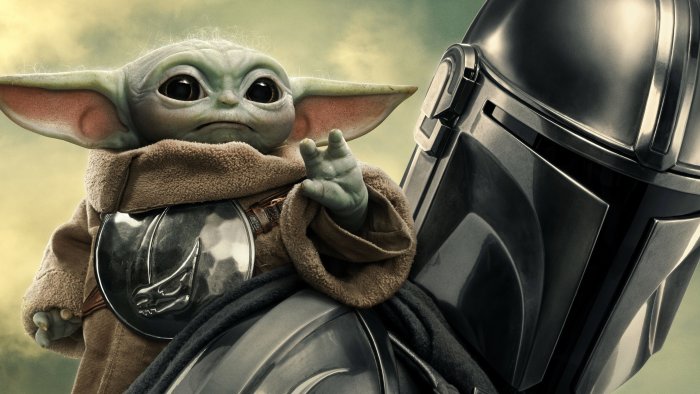 Grogu and Din Djarin in Star Wars The Mandalorian