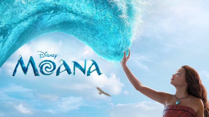 Live-action Moana touching the ocean wave