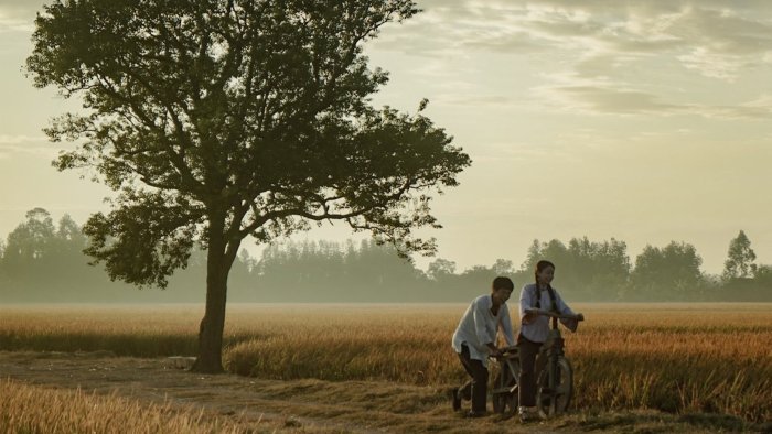 A Man and Woman with a Bicycle in Dear You