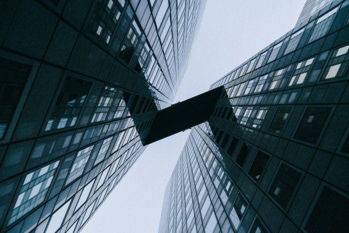 Low Angle View of Modern Skyscrapers with Skybridge