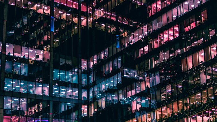 Illuminated office windows of a skyscraper at night