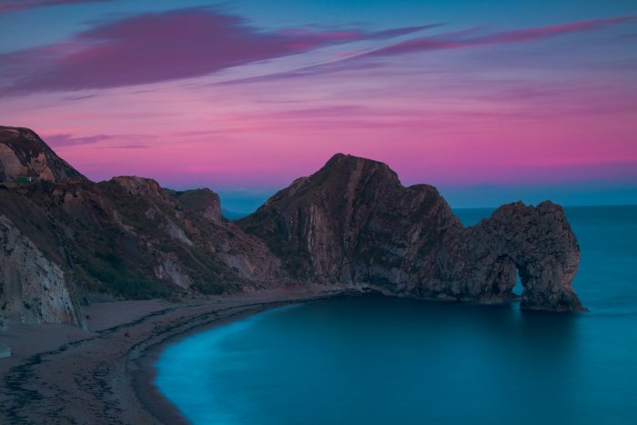 Durdle Door Natural Arch and Cove at Sunset