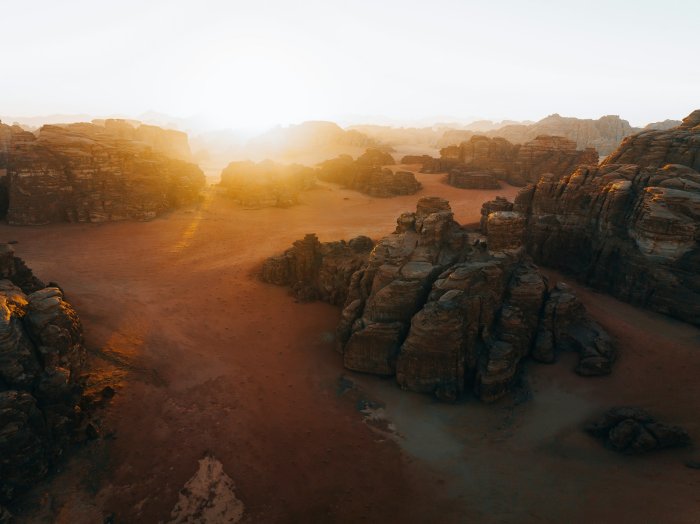 Golden sunset over sandstone plateau in Hisma Desert