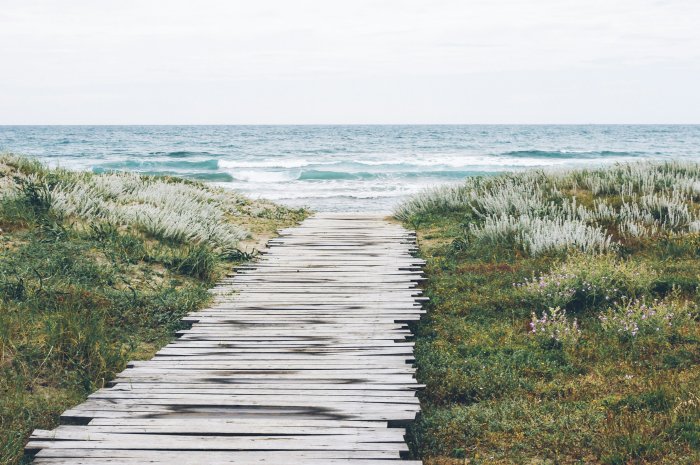 Wooden boardwalk leading to the ocean beach
