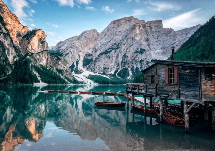 Wooden boathouse and rowboats on Lake Braies