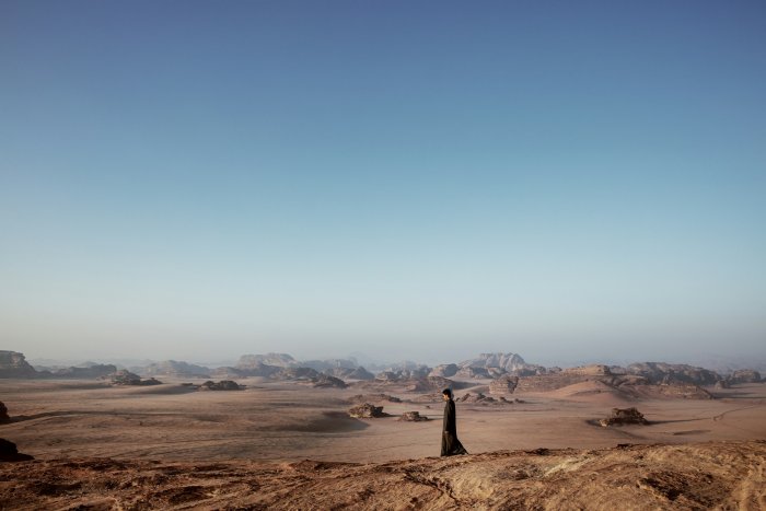 Person walking in the Hisma Desert of NEOM