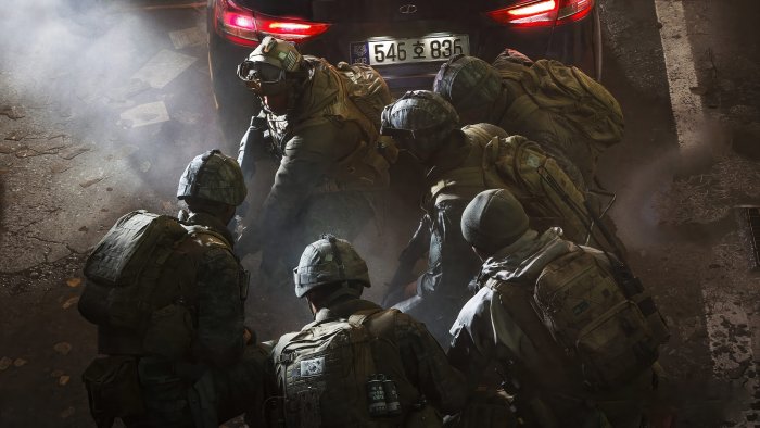 South Korean Soldiers Crouching Behind a Car