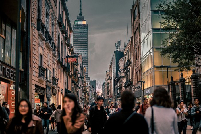 Crowded Pedestrian Street with Torre Latinoamericana in Mexico City