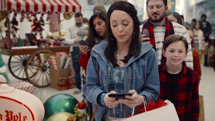 People Waiting in Line in Dear Santa