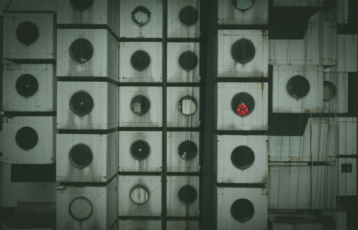 Nakagin Capsule Tower with Person in Red Jacket