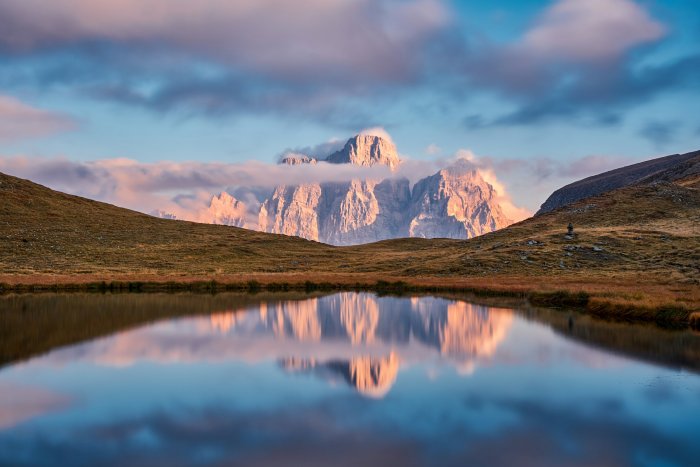 Mountain Peak Reflected in a Calm Alpine Lake