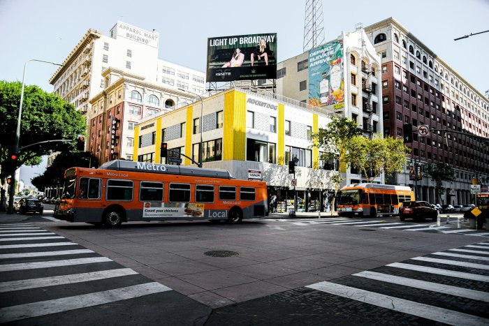 Orange Metro Buses in Los Angeles Intersection
