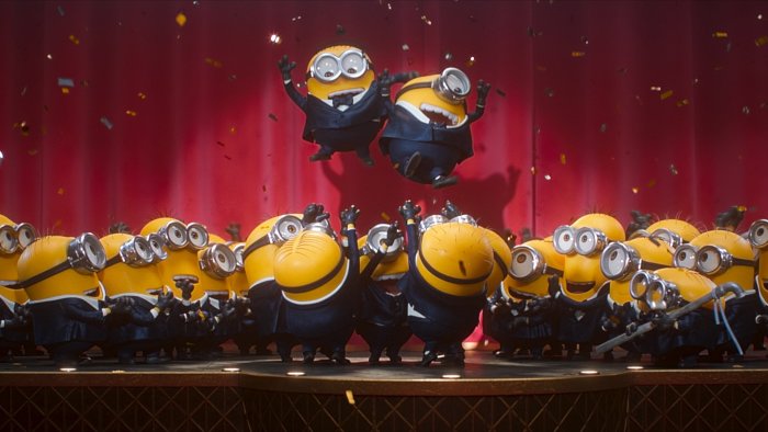 Minions in Tuxedos Performing on Stage