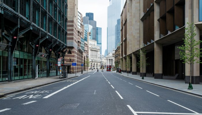 Empty city street in London with skyscrapers