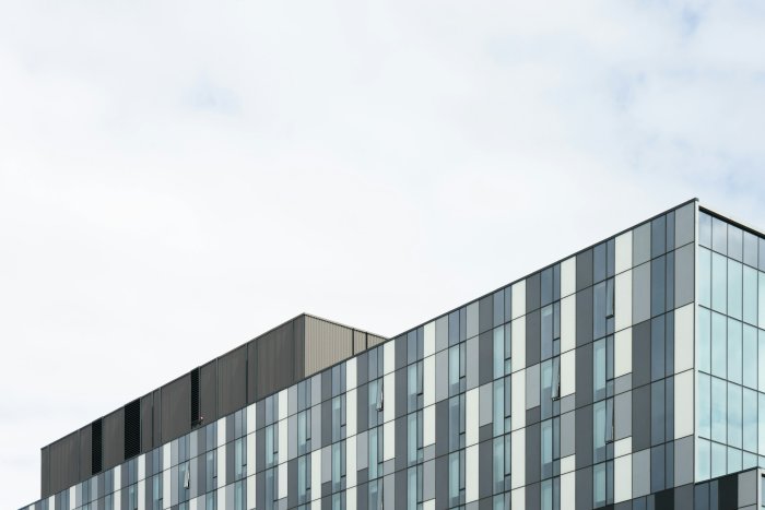Modern Gray Building Facade Against Overcast Sky