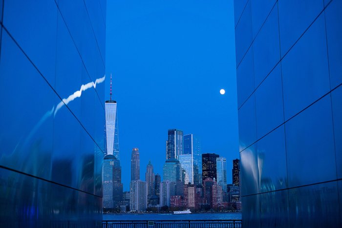 Manhattan Skyline and One World Trade Center Framed by Walls