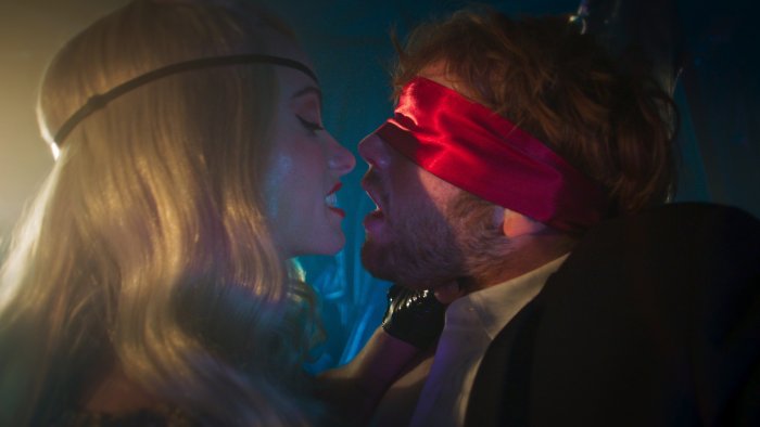 Blonde Woman and Blindfolded Man in I Want Your Sex
