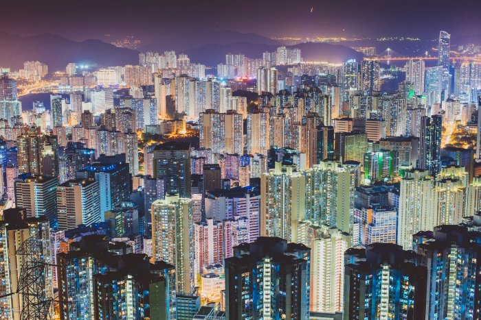 Dense High-Rise Skyscrapers in Hong Kong at Night