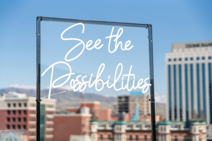 See the Possibilities Sign with City Skyline