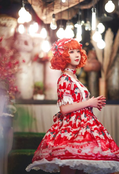 Young Woman in Red Sweet Lolita Dress
