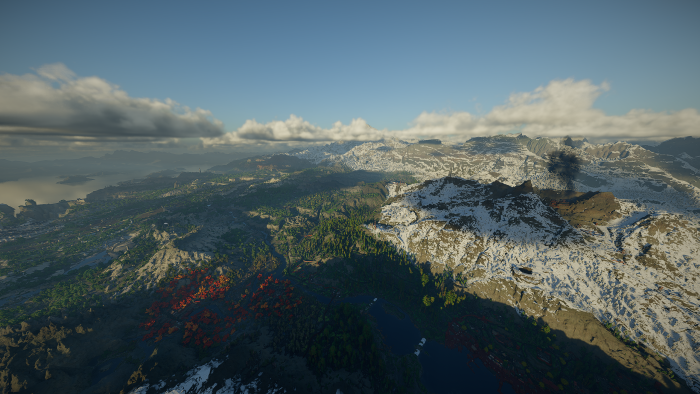 Aerial view of vast mountainous landscape with snow