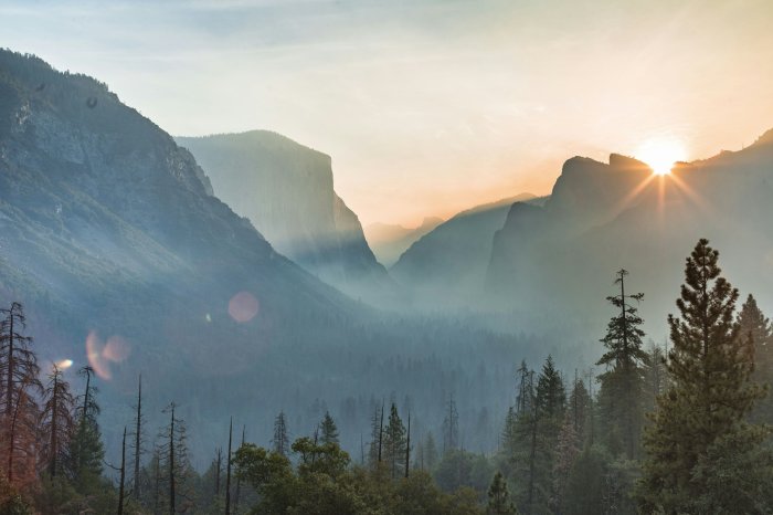 Sunrise over smoky Yosemite Valley from Tunnel View