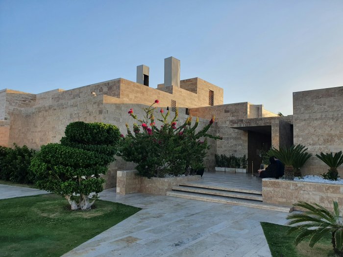 Modern Stone Architecture with Landscaped Garden