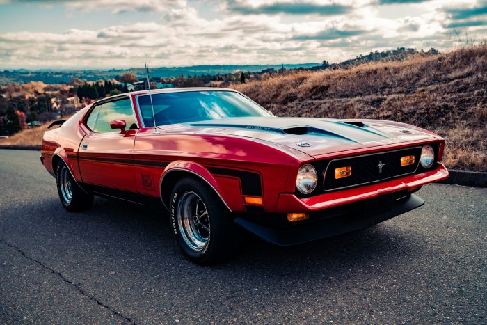 Red 1972 Ford Mustang Mach 1 on Road