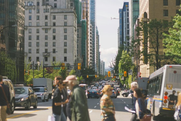 Pedestrians crossing a busy city street