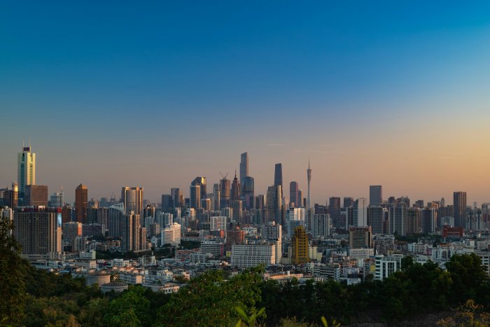 Guangzhou City Skyline Viewed from a Hill at Sunset