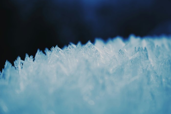 Macro photography of sharp white ice crystals
