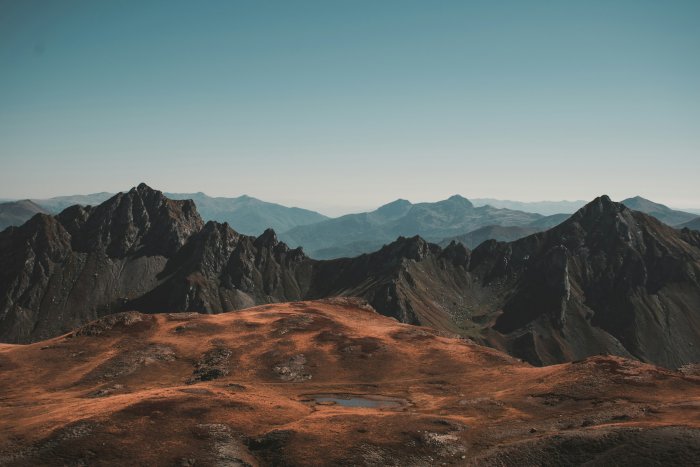 Mountain range with a small lake in the foreground