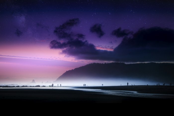Starry Sunset over Cannon Beach with Silhouetted People